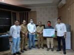 BPJS Ketenagakerjaan Serahkan Santunan 25 Miliar di Peringatan Hari Pelanggan Nasional